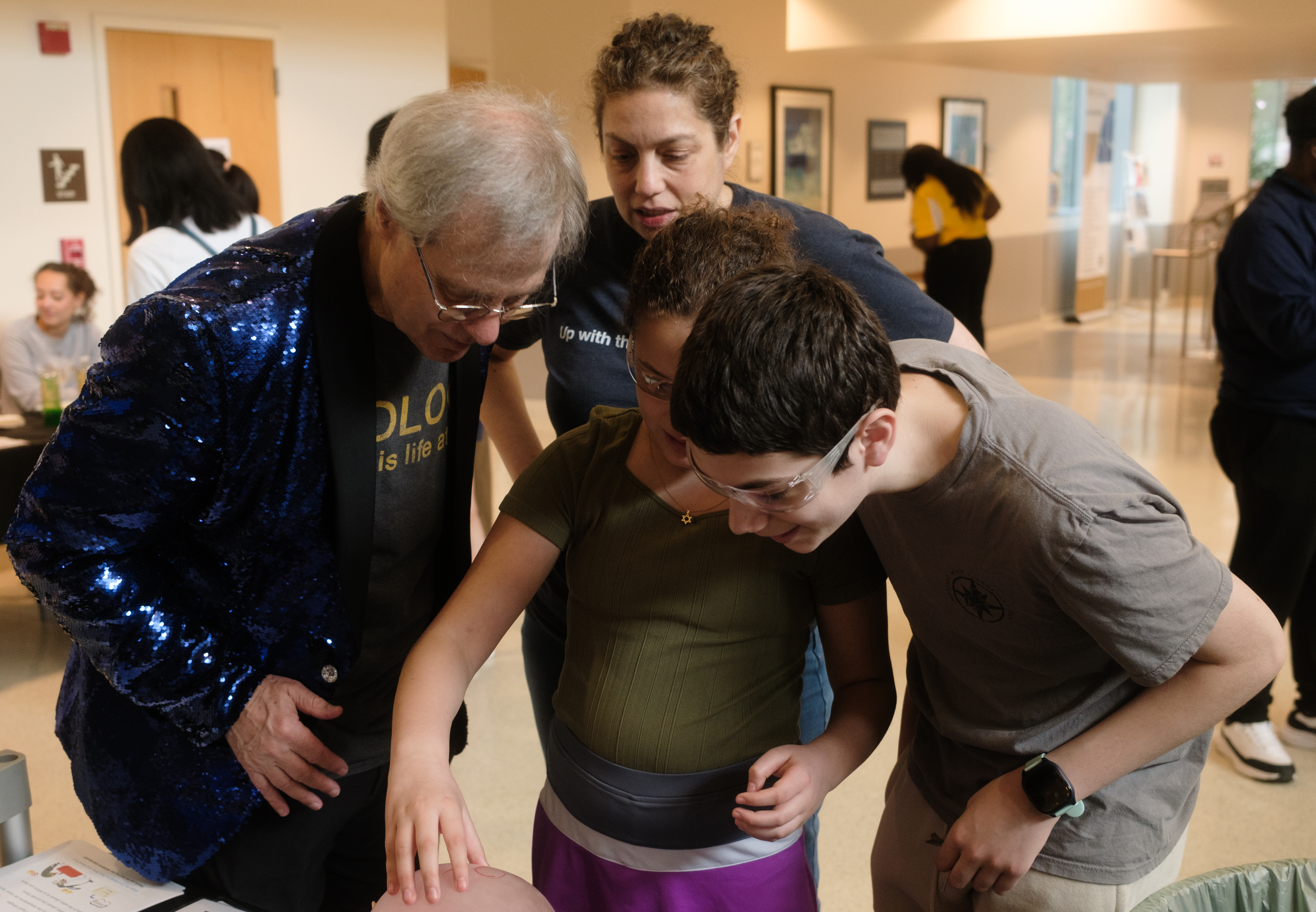 Profs. Loren Williams and Raquel Lieberman work with young ASF participants.